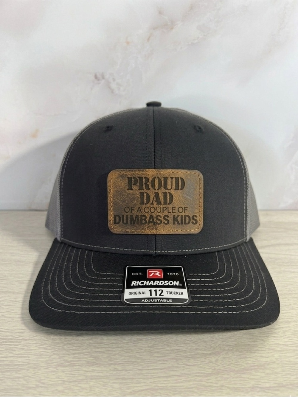 Richardson Trucker Hat with 'Proud Dad' laser engraved leather patch